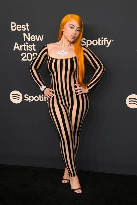 Ice Spices striped catsuit gives naked dressing meets Beetlejuice